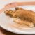 Envuelto en arepa de choclo
